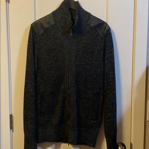 Men’s sweater with leather accents